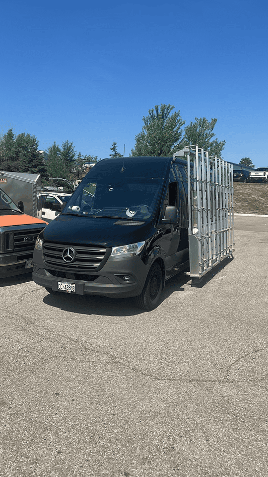 Glass 911 van with replacement glass loaded on its side rack, ready to dispatch